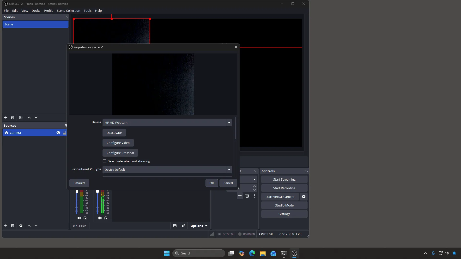 The Properties dialog for a camera source with the Device dropdown showing a webcam
