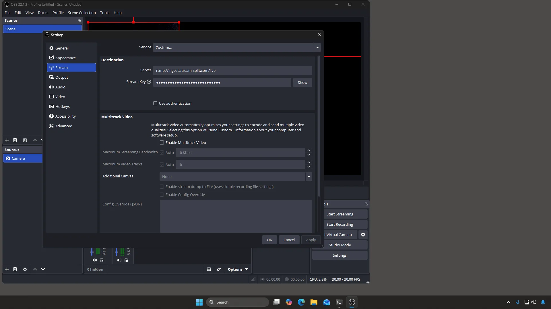 OBS Settings Stream tab with Service set to Custom and the Server and Stream Key boxes filled in